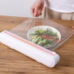 Dispenser och Skärare för Plastfolie