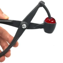 Körsbärs- och olivkärnare i aluminium, 18 cm