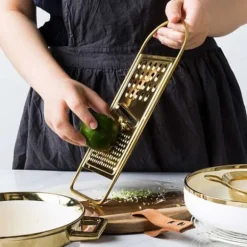 Platt rivjärn ostriv i rostfritt stål