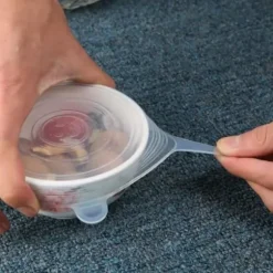 SHOP-STORY - Förpackning med 6 universella expanderbara silikonlock av livsmedelskvalitet för rektangulära eller ovala fyrkantiga behållare