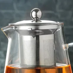 Tekanna av glas - 1300 ml kapacitet, värmebeständigt, ergonomiskt handtag - perfekt för lösblad och blommande te