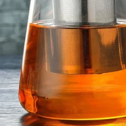 Tekanna av glas - 1300 ml kapacitet, värmebeständigt, ergonomiskt handtag - perfekt för lösblad och blommande te