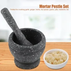 Vitlökskvarn i plast - köksredskap för att mala kryddor och örter